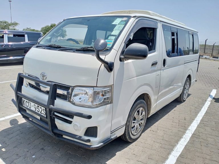 White passenger van for hire at JKIA airport Nairobi for group travel and airport transfers