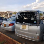 Two packed airport transfer cars ready for pickup from Kilimani to JKIA Airport