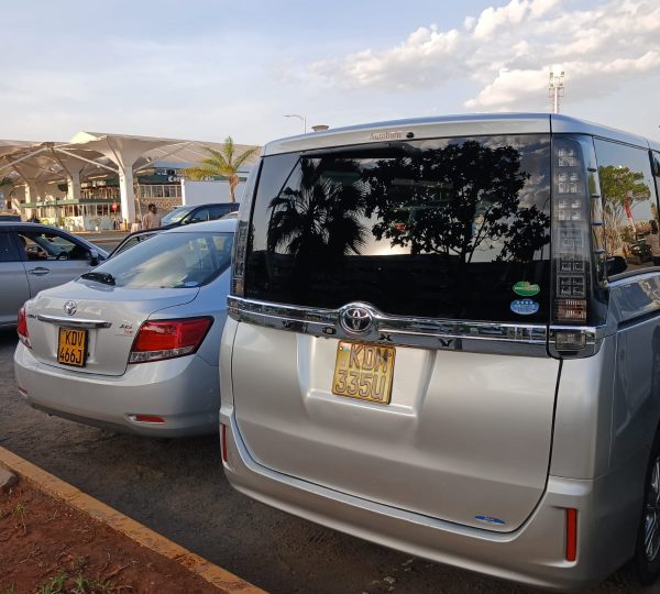 Two packed airport transfer cars ready for pickup from Kilimani to JKIA Airport