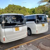 Nairobi airport transfer vans parked at JKIA for passenger pickup